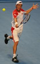 Kei Nishikori backhand volley during the Australian Open 2011.JPG
