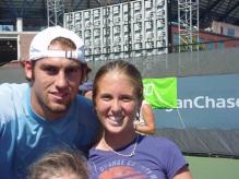 Robby Ginepri takes a picture with a girl fan.jpg