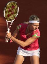 Maria Kirilenko double handed backhand follow through at the 2011 French Open.JPG