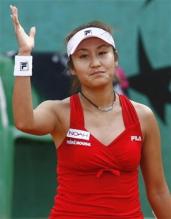 Akiko Morigami in red Fila tennis outfit.jpg