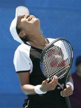 Akiko Morigami reacts after making an error.jpg