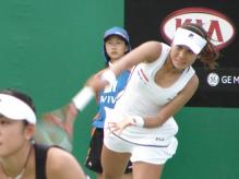 Akiko Morigami serve follow through.jpg
