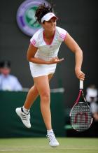 Laura Robson follows through on her serve at Wimbledon 2011.JPG