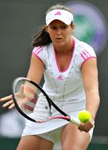 Laura Robson goes for a backhand drop shot volley at 2011 Wimbledon.JPG