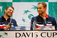 Mardy Fish laughs at something Andy Roddick says.JPG
