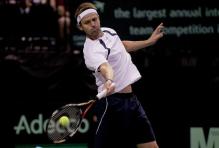 Mardy Fish strikes a forehand during 2011 Davis Cup in Austin Texas.JPG