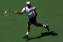 andy roddick running forehand at contact.jpg