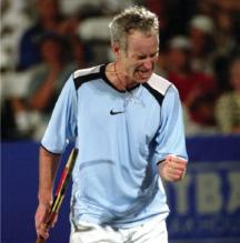 John McEnroe celebrates with a fist pump.jpg