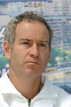 John McEnroe looks on.jpg