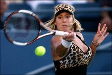bethanie mattek forehand at contact.jpg