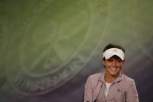 Laura Robson smiles during a press conference after winning the 2008 Wimbledon juniors.jpg