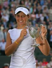 Laura Robson smiles while holding her championship trophy for Wimbledon 2008 juniors.jpg