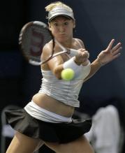 bethanie mattek forehand before contact.jpg