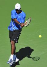 Donald Young hits a two-handed backhand.jpg