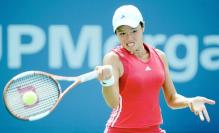 Chan Yung-Jan smacks a forehand.jpg