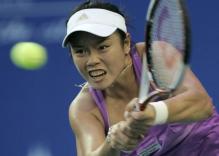 Chan Yung-Jan hits a 2 handed return.jpg