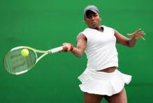 Ahsha Rolle hits a forehand.jpg