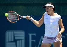 Chan Yung-Jan smacks a forehand.jpg