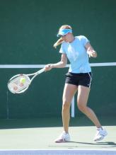 Nicole Vaidisova hits a forehand.jpg