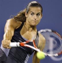 Amelie Mauresmo hits a one handed backhand during the US Open 2008.jpg