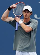 Andy Murray flexes his biceps.jpg