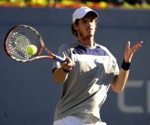 Andy Murray hits a topspin forehand.jpg