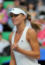 Maria Kirilenko is happy about a point.jpg