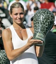 Maria Kirilenko holds her Hansol Korea Open Championship trophy.jpg