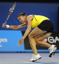 Dinara Safina digs up a low ball with her forehand.jpg