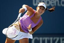 ana ivanovic serve follow through.jpg