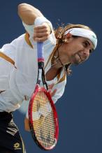 david-ferrer-serve-follow-through.jpg