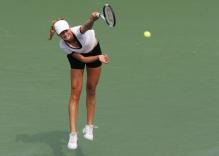 ekaterina makarova serve after contact.jpg