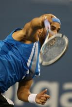 james blake serve follow-through.jpg