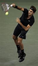 roger federer serve after contact.jpg