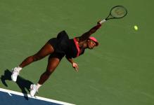 serena williams serve after contact.jpg