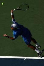stanislas wawrinka serve before contact.jpg