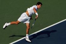 tim henman serve follow-through.jpg